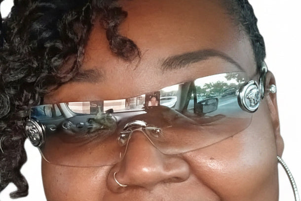 Close-up of a person wearing futuristic sophisticated glasses